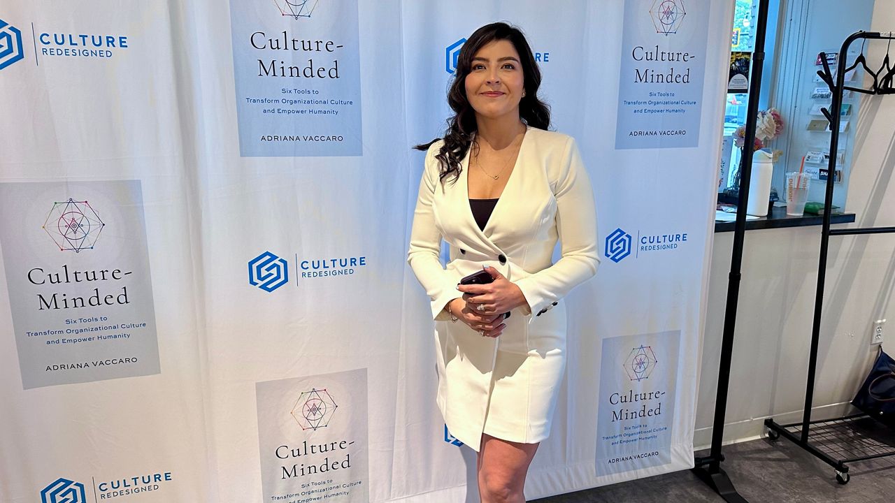 Author Adriana Vaccaro at her book signing and presentation at the Jean McDonough Arts Center (Spectrum News1/Kevin Shea)