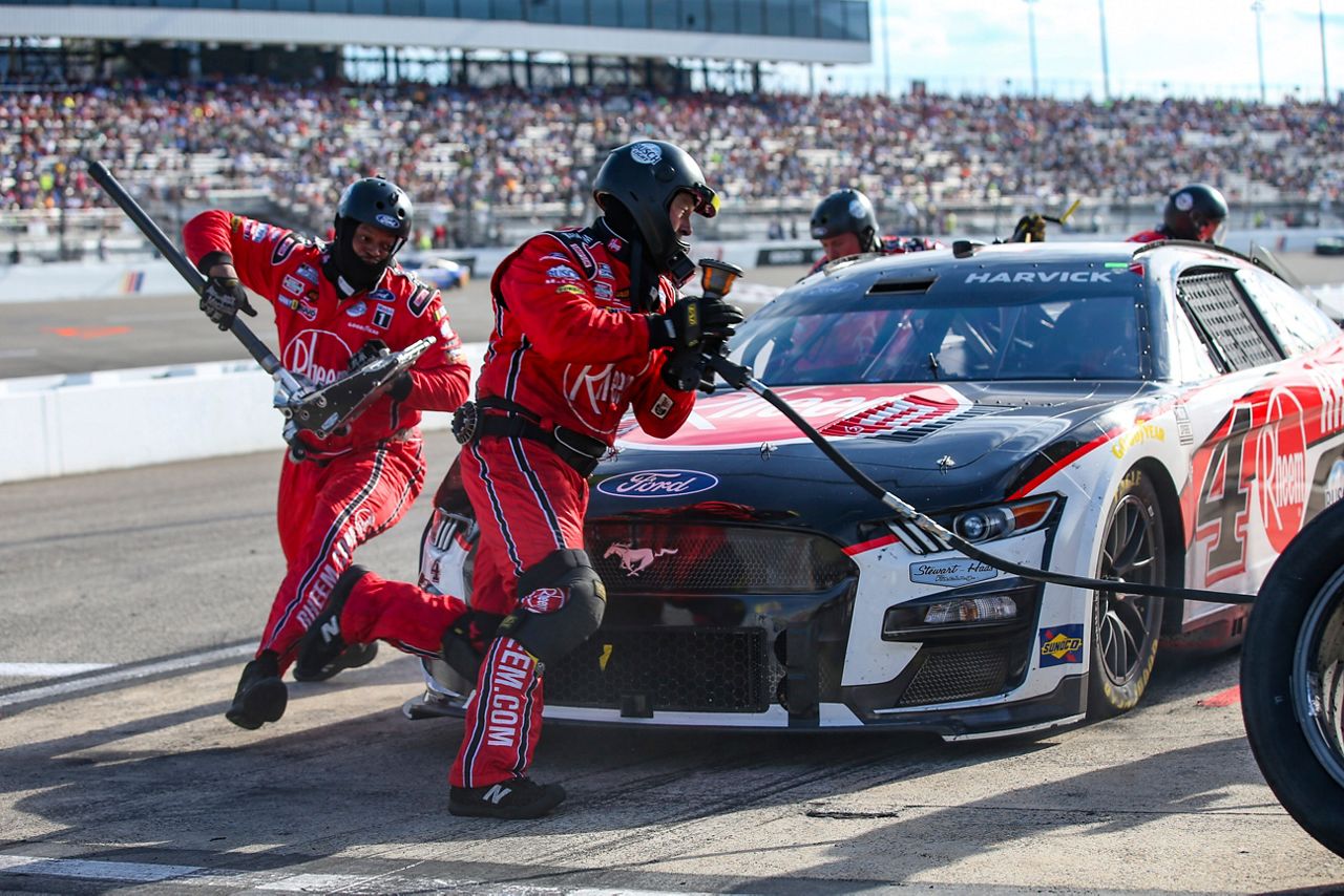 Kevin Harvick makes a green-flag pitstop in the last stage of a NASCAR Cup Series auto race, Sunday, July 30, 2023, in Richmond, Va. (AP Photo/Skip Rowland)