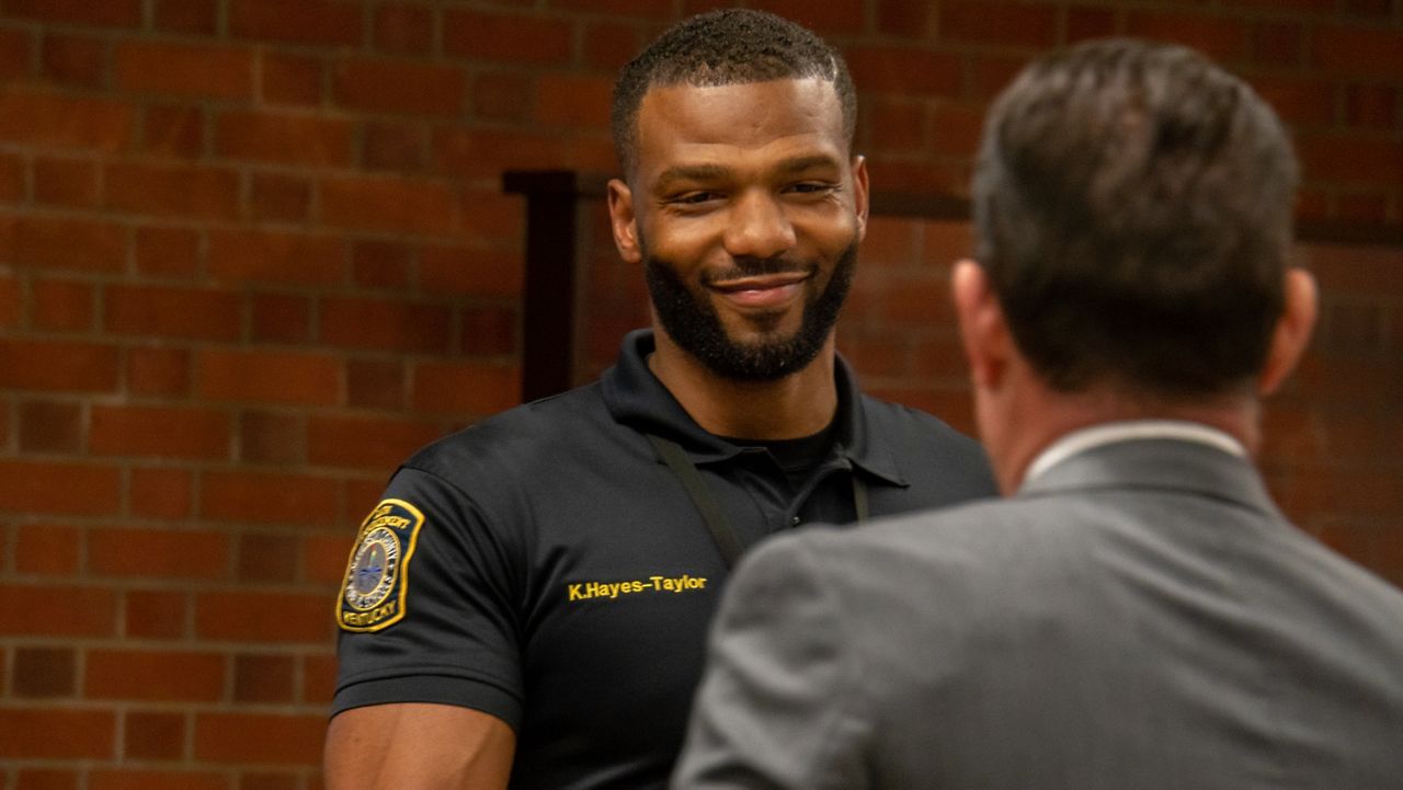 Kevin Hayes-Taylor, the district’s newest officer, is recognized during an October JCPS school board meeting (Spectrum News 1/Mason Brighton)