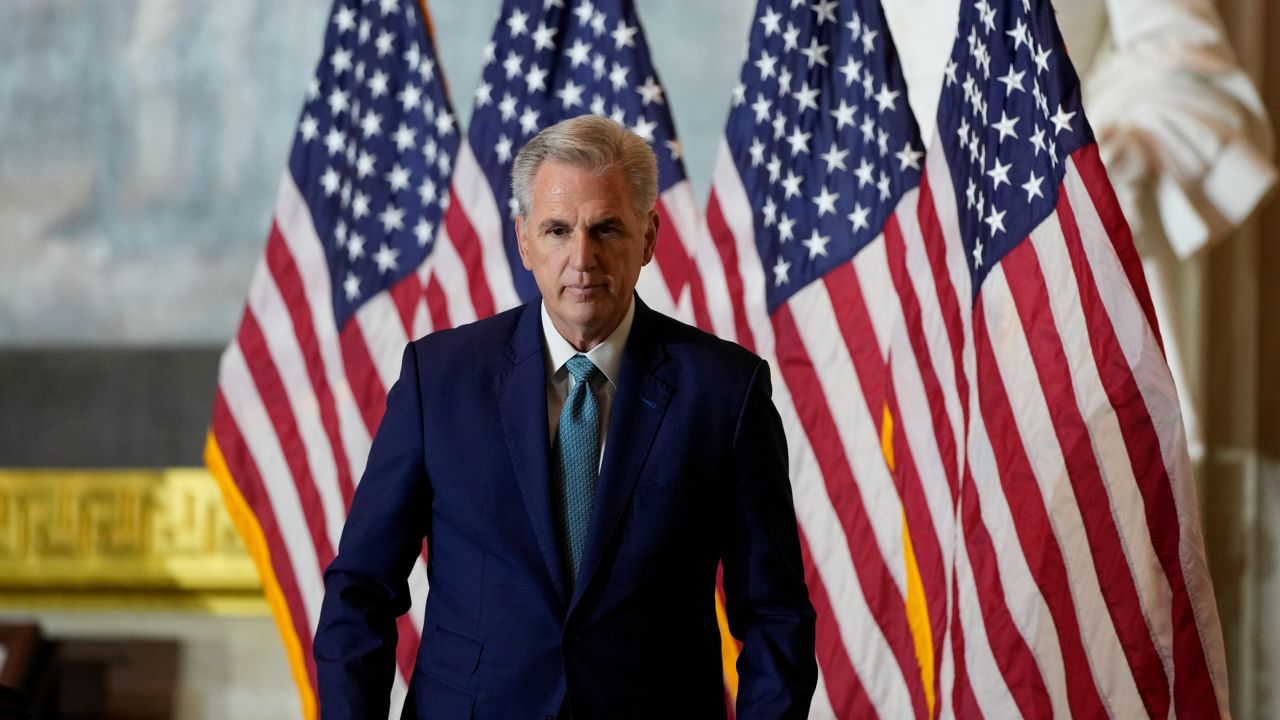 House Minority Leader Kevin McCarthy departs the Capitol Rotunda on Tuesday after speaking during a Congressional Gold Medal ceremony honoring law enforcement officers who defended the U.S. Capitol on Jan. 6, 2021. (AP Photo/Alex Brandon)