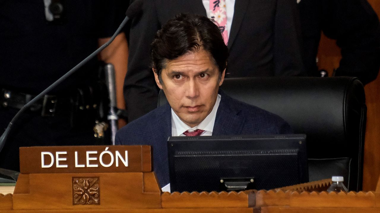 Los Angeles City Council member Kevin de Leon sits in chamber during the Los Angeles City Council meeting Tuesday, Dec. 13, 2022, in Los Angeles. A small group of protesters chanted throughout the meeting calling for the resignation of Councilman de Leon. (AP Photo/Ringo H.W. Chiu)