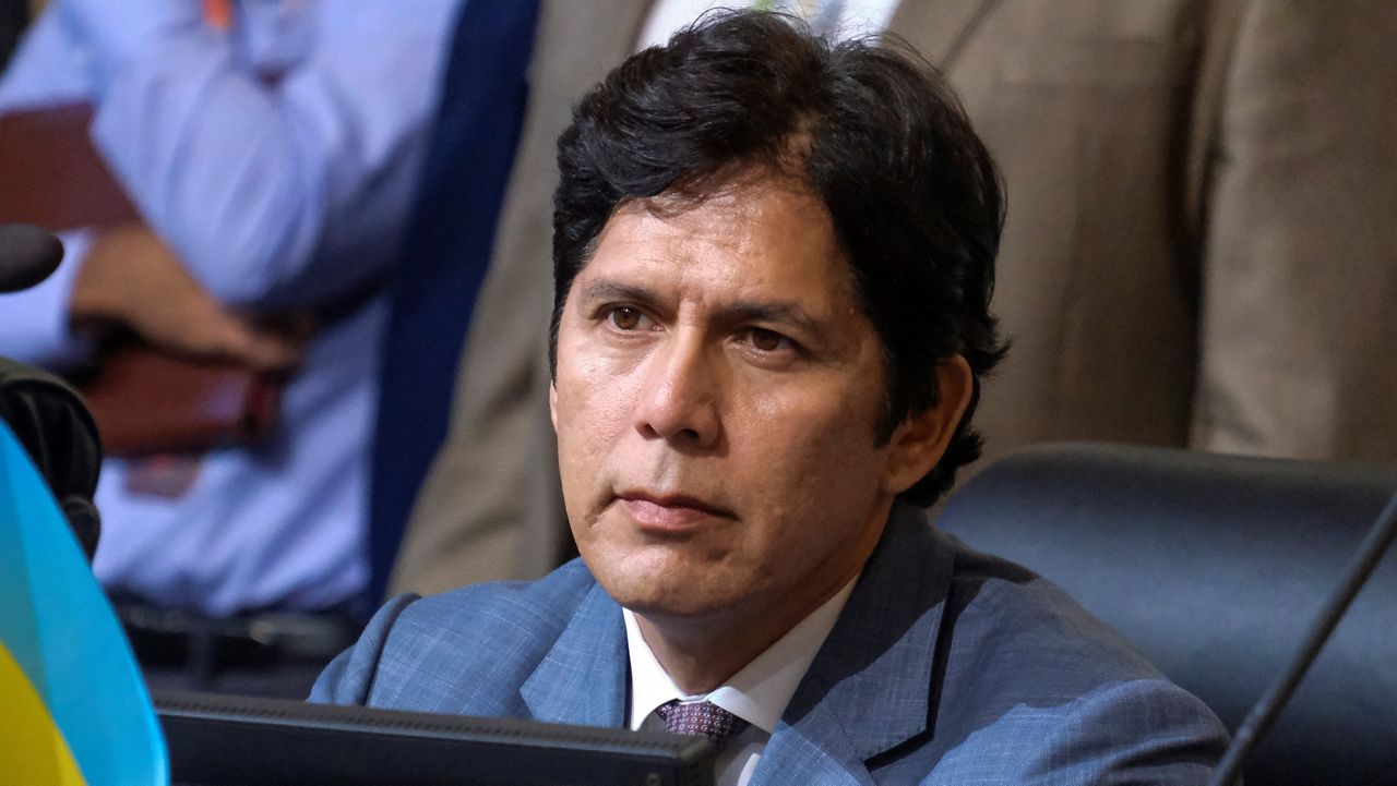 Los Angeles City Council member Kevin de Leon sits in chamber before starting the Los Angeles City Council meeting, Tuesday, Oct. 11, 2022 in Los Angeles. (AP Photo/Ringo H.W. Chiu)