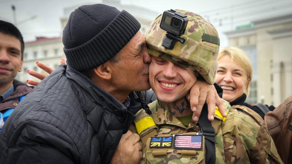 A Kherson resident kisses a Ukrainian soldier in central Kherson, Ukraine, Sunday, Nov. 13, 2022. Ukraine liberated Kherson more than one week ago, and the city’s streets are revived for the first time in many months. (AP Photo/Efrem Lukatsky, file)