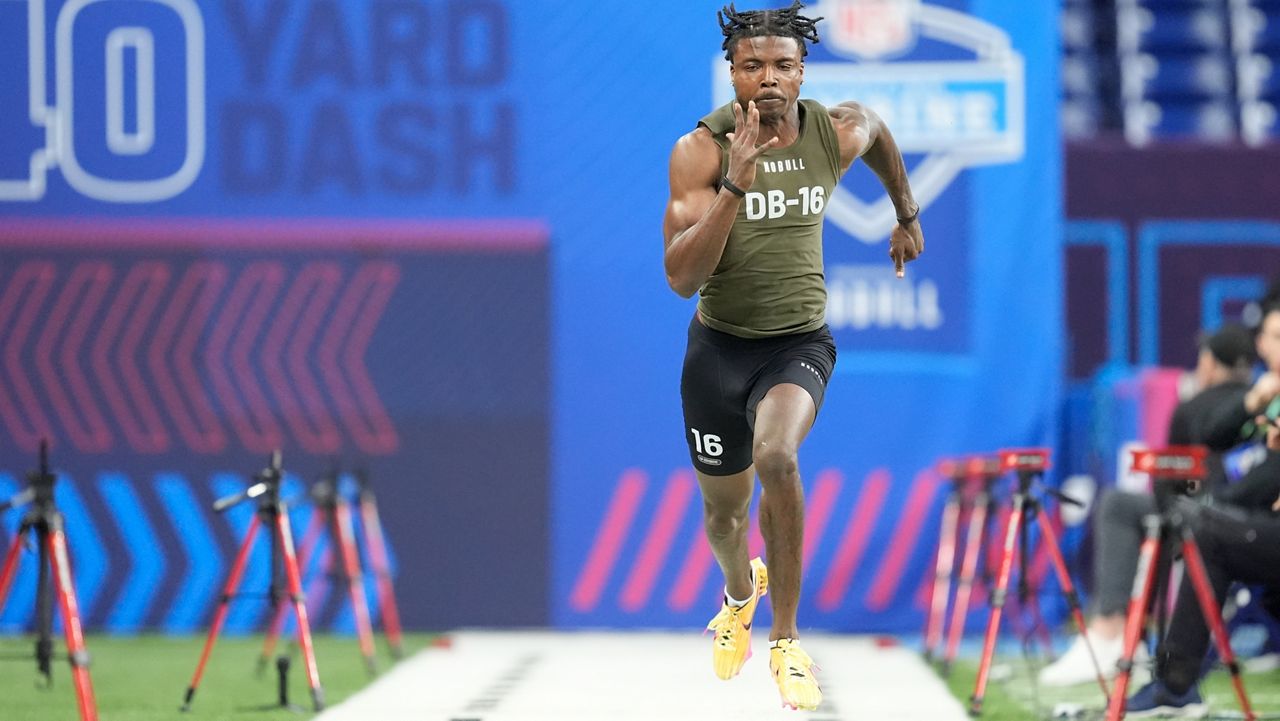 Khyree Jackson runs the 40-yard dash at the NFL football scouting combine, Friday, March 1, 2024, in Indianapolis. (AP File Photo/Michael Conroy)