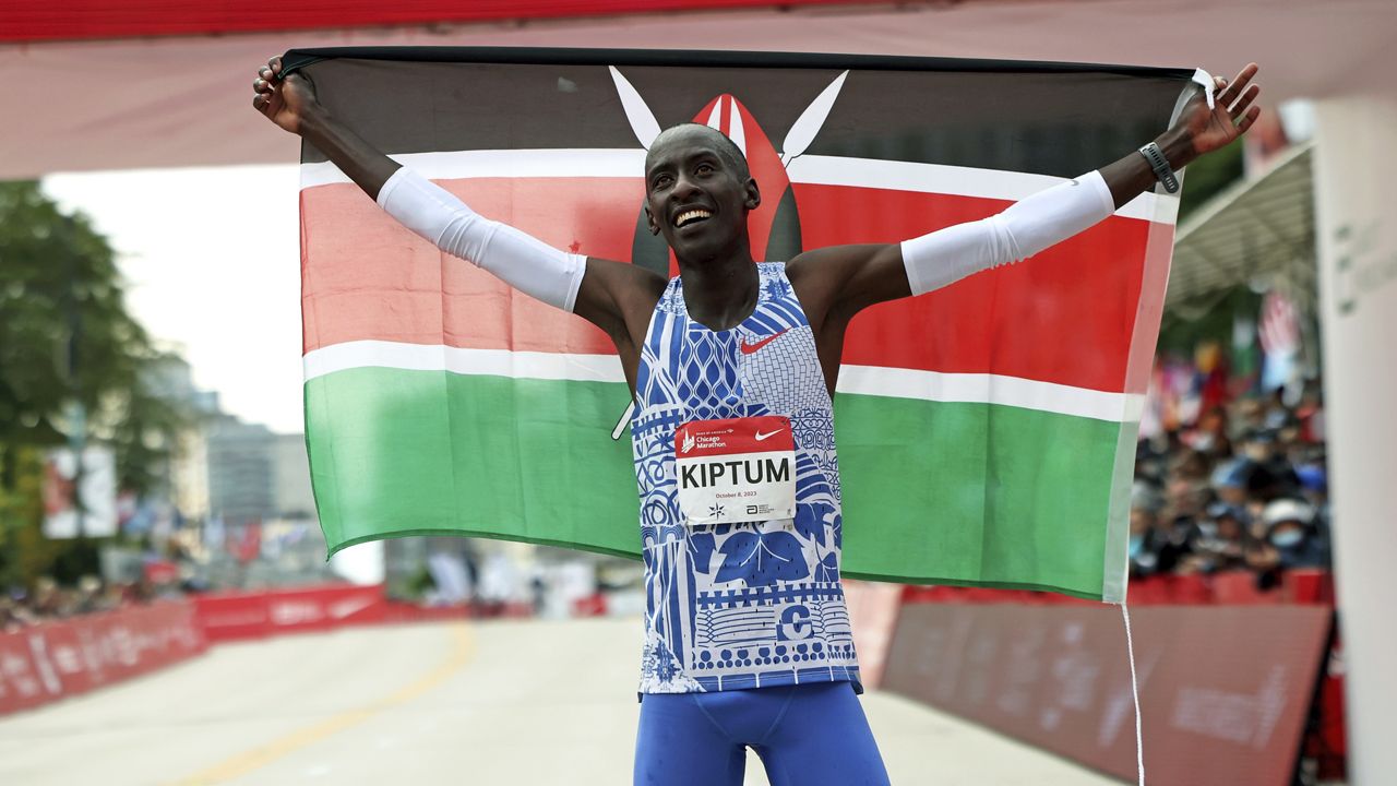 Kelvin Kiptum of Kenya celebrates his Chicago Marathon world record victory in Chicago's Grant Park on Sunday, Oct. 8, 2023. (Eileen T. Meslar/Chicago Tribune via AP)