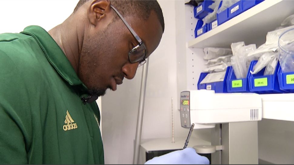 USF defensive end Kirk Livingstone is a pre-med major balancing his passion for football with his passion for medicine. 