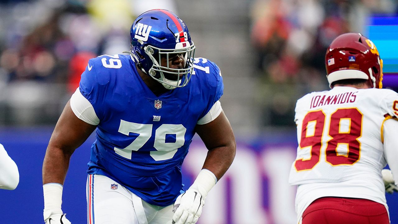 New York Giants offensive tackle Korey Cunningham (79) at the line of scrimmage against the Washington Football Team during the fourth quarter of an NFL football game, Sunday, Jan. 9, 2022, in East Rutherford, N.J. (AP Photo/Frank Franklin II)