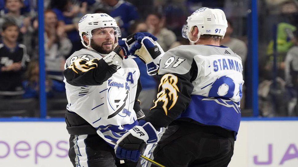 Tampa Bay Lightning right wing Nikita Kucherov (86) celebrates his goal against the Calgary Flames with center Steven Stamkos (91) during the second period Thursday, Nov. 17, 2022, in Tampa, Fla. (AP Photo/Chris O'Meara)