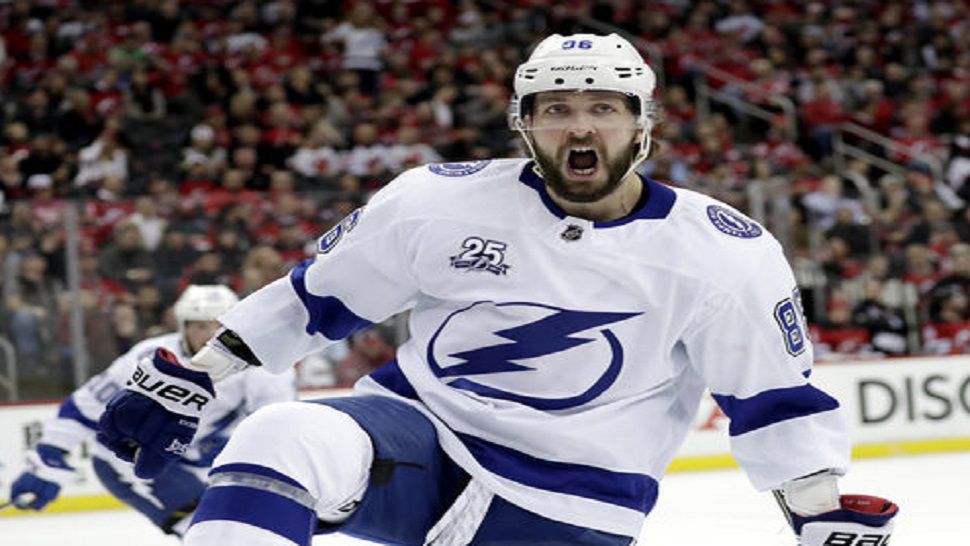Tampa Bay Lightning right wing Nikita Kucherov, of Russia, celebrates his goal against the New Jersey Devils during the first period of Game 4 of an NHL first-round hockey playoff series Wednesday, April 18, 2018, in Newark, N.J. (AP Photo/Julio Cortez) 