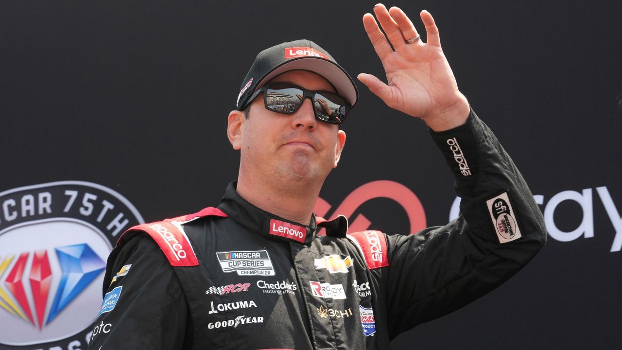 FILE - NASCAR Cup Series driver Kyle Busch is introduced before the Crayon 301 NASCAR Cup Series race, Monday, July 17, 2023, at New Hampshire Motor Speedway, in Loudon, N.H. Denny Hamlin and Busch return to Pocono Raceway a year after they suffered disqualifications and had their 1-2 finishes thrown out. (AP Photo/Steven Senne, File)