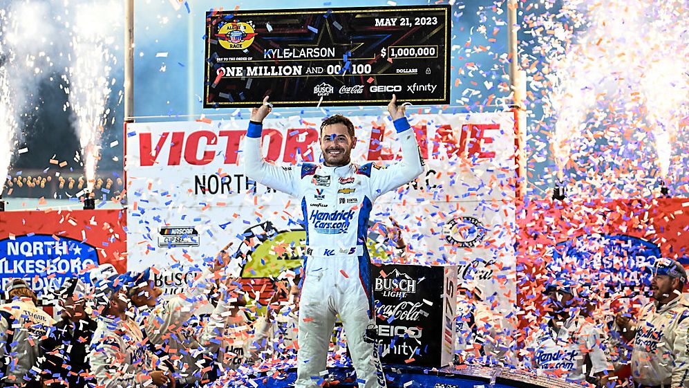Kyle Larson (5) celebrates in Victory Lane after winning the NASCAR All-Star Cup Series at North Wilkesboro Speedway, Sunday, May 21, 2023, in North Wilkesboro, N.C. (AP File Photo/Matt Kelley)