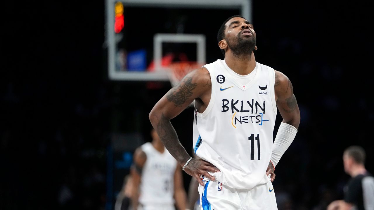 Brooklyn Nets' Kyrie Irving reacts during the second half of the team's NBA basketball game against the Detroit Pistons Thursday, Jan. 26, 2023 in New York. All-Star guard Kyrie Irving has asked the Nets for a trade. He made the request after talks about a new contract did not go to his liking, a person told The Associated Press on condition of anonymity because talks were to remain private. It was first reported by ESPN and The Athletic. (AP Photo/Frank Franklin II)