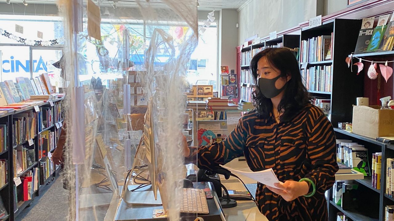 Chevalier's Books staffer Theresa Phung. (Spectrum News/David Mendez)