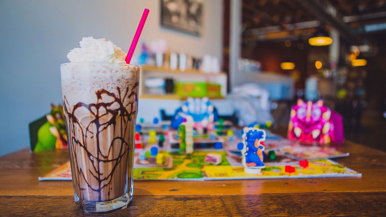 A beverage and board game from Game Haus Cafe in Glendale. (Courtesy Game Haus Cafe)