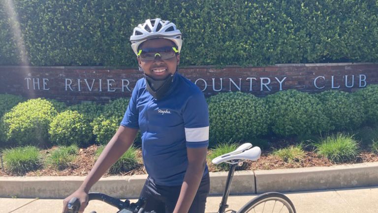 Young cyclist Benjamin Gorman-Stamps prepares for his celebratory 111 mile bike ride. (Photo courtesy Mia Gorman)