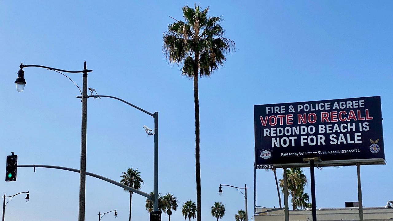 A billboard along Artesia Boulevard in Redondo Beach advocates against the recall of Council member Zein Obagi in the city's upcoming Oct. 19 special election. (Spectrum News/David Mendez)