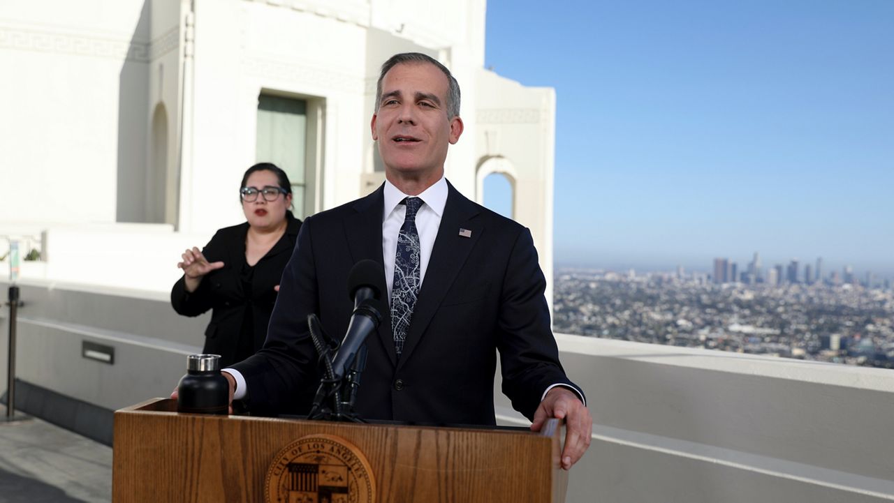 Los Angeles Mayor Eric Garcetti delivers his annual State of the City address from the Griffith Observatory, Monday, April 19, 2021, in Los Angeles. (Gary Coronado/Los Angeles Times via AP, Pool)