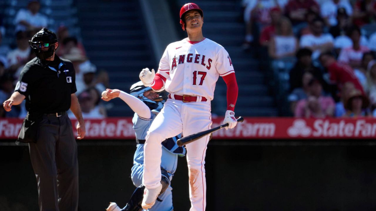 Los Angeles Angels' Shohei Ohtani reacts to a missed swing during the ninth inning of a baseball game against the Toronto Blue Jays Sunday in Anaheim, Calif. (AP Photo/Marcio Jose Sanchez)