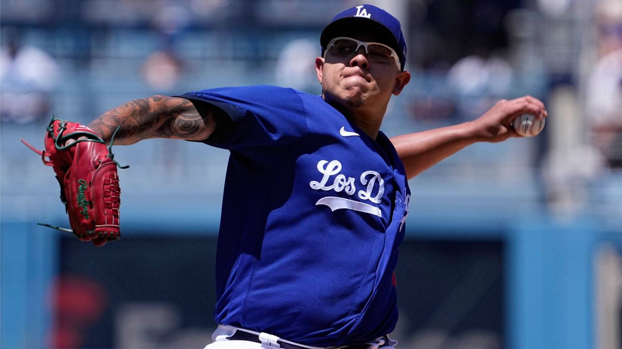 Urías strikes out 12, Dodgers rout Rockies 8-3