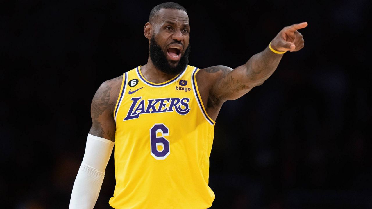 Los Angeles Lakers' LeBron James (6) points to a teammate during the first half in Game 4 of a first-round NBA basketball playoff series against the Memphis Grizzlies Monday in LA. (AP Photo/Jae C. Hong)