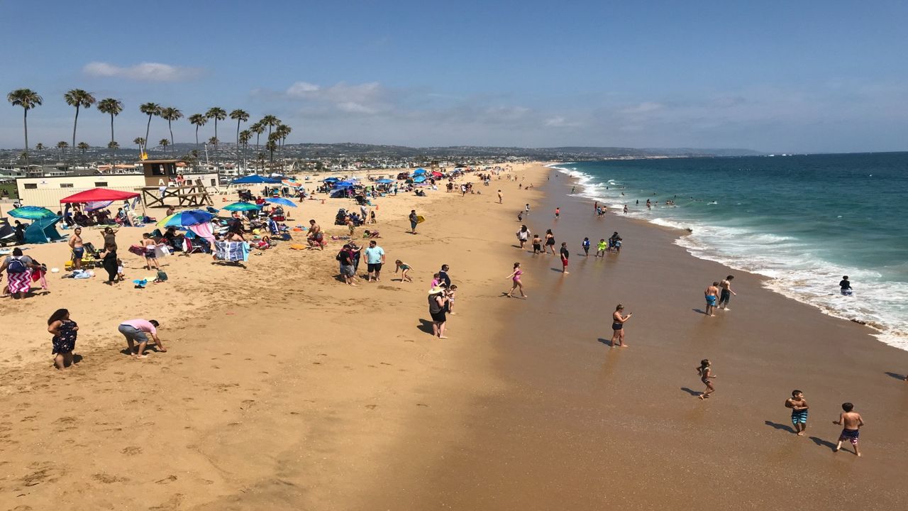 Warm beach days are still possible in fall and winter in SoCal but water temperatures drop into the low 60s and 50s