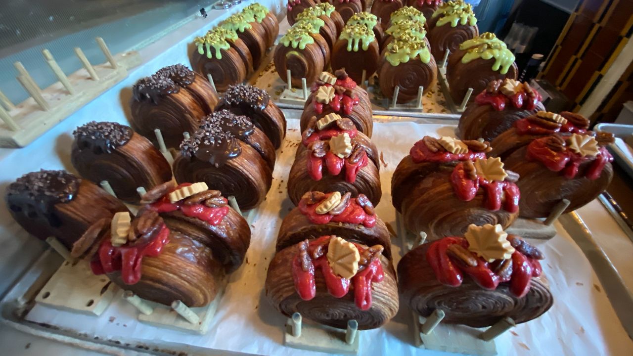 The Suprême, a cream-filled croissant from Lafayette Grand Café & Bakery, has become a viral sensation. The pastries are pictured.