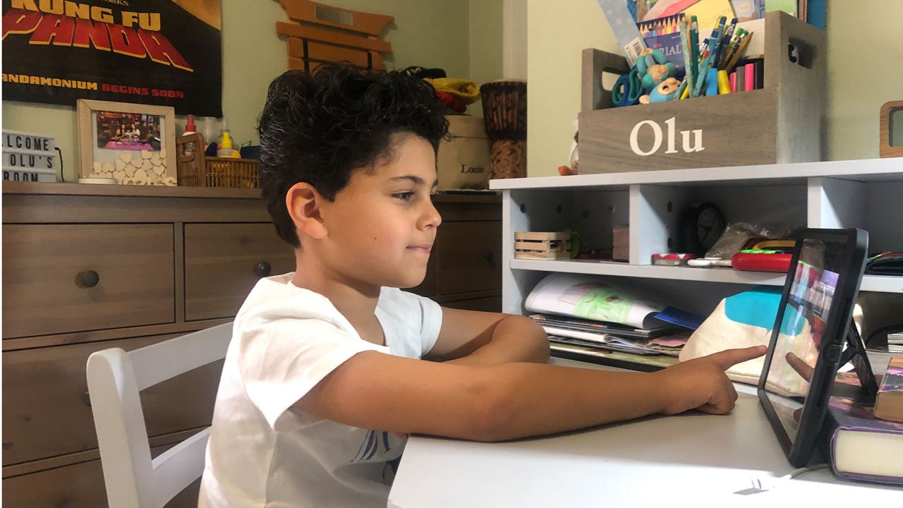 A kid doing distance learning