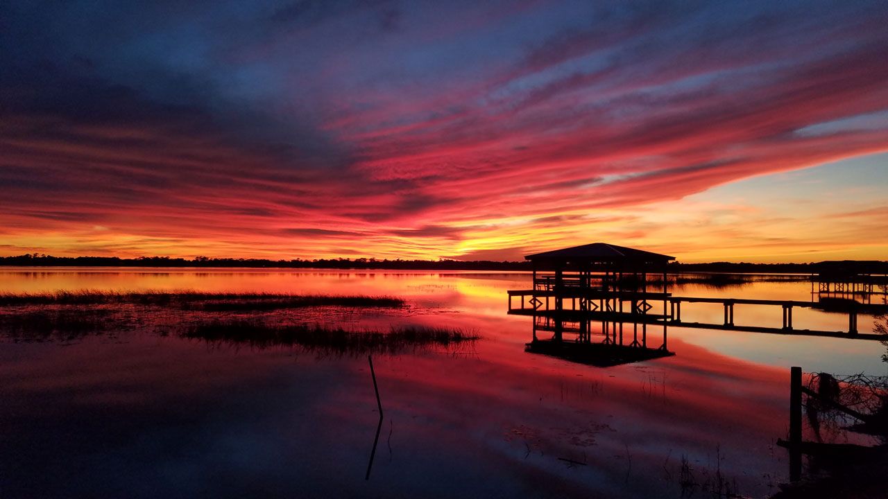 Sent via Spectrum News 13 app: A fall sunset in Central Florida. This was taken over Lake Lizzy in St. Cloud. (Ruth Anderson, Viewer)