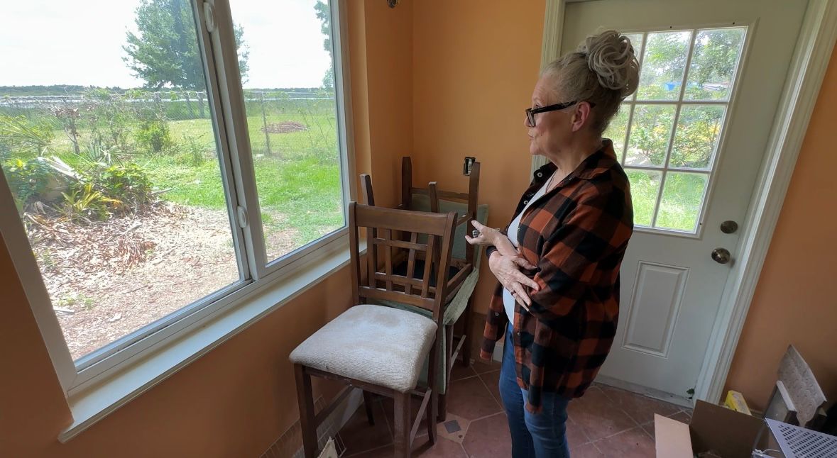 Jan Morsey looks at Lake Bonny from her window. (Spectrum Bay News 9/Alexis Jones)