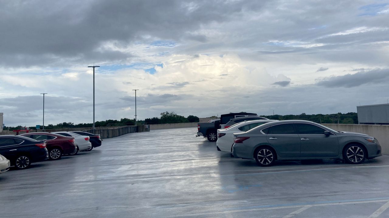 Taken at 0815 7/7 on the roof top of Lakeland Regional Hospital. Looks like the clouds are breaking up at least for a little while. (Carolyn Gallagher)
