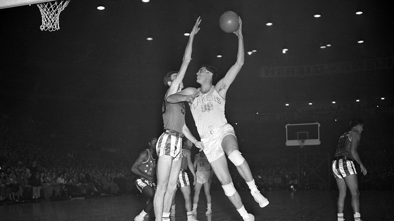 Los Angeles Lakers retired George Mikan's jersey number 99