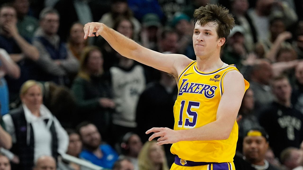 Los Angeles Lakers' Austin Reaves reacts after making a three pointer 