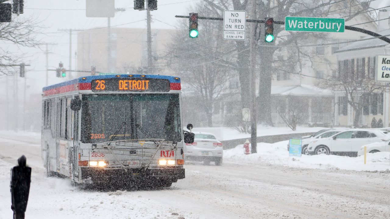 A Greater Cleveland Regional Transit Authority bus makes its way down Detroit Avenue in Lakewood, Ohio during a snowstorm. (Spectrum News 1/Lydia Taylor)