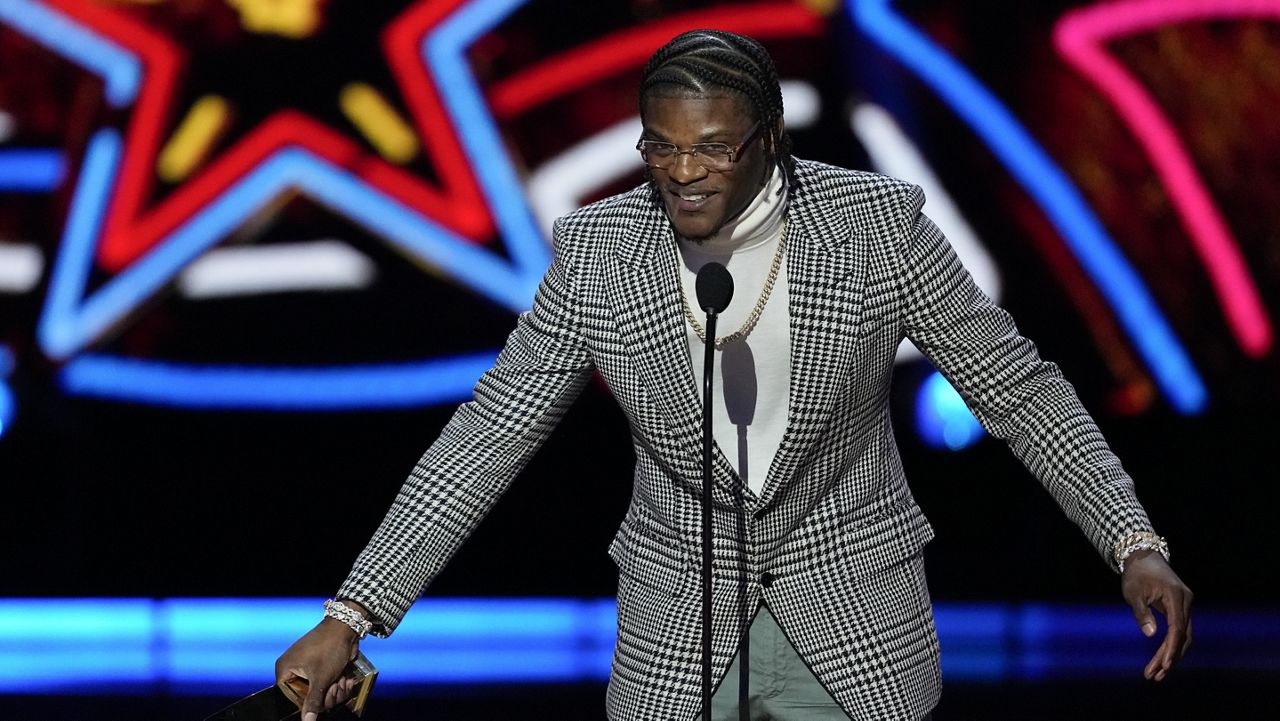 Baltimore Ravens' Lamar Jackson, AP Most valuable player speaks during the NFL Honors award show ahead of the Super Bowl 58 football game Thursday, Feb. 8, 2024, in Las Vegas. The San Francisco 49ers face the Kansas City Chiefs in Super Bowl 58 on Sunday. (AP Photo/David J. Phillip)