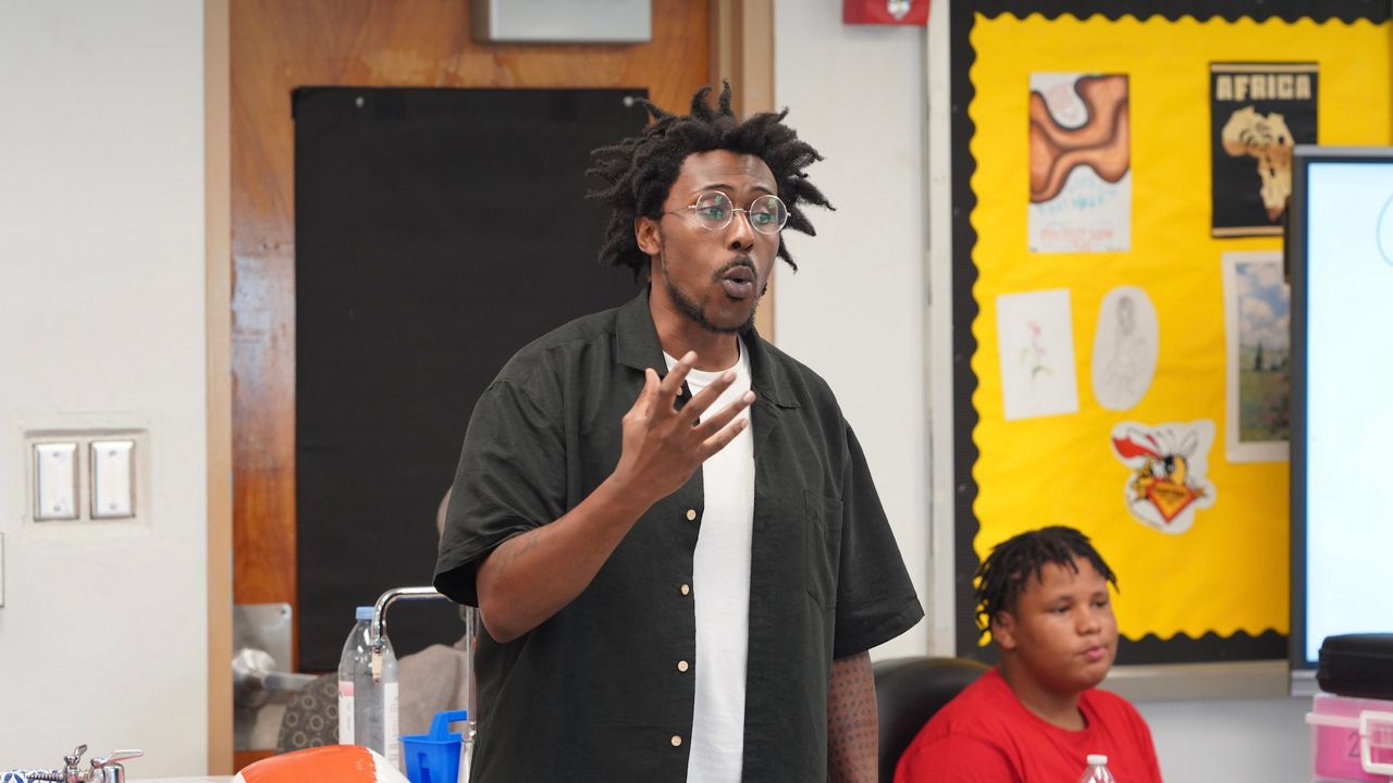 Life-saving device keeps Louisville artist in the classroom 
