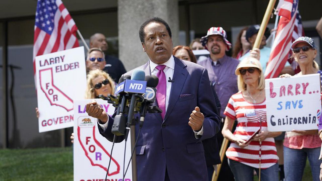 In this July 13, 2021 file photo radio talk show host Larry Elder speaks to supporters during a campaign stop in Norwalk, Calif. (AP Photo/Marcio Jose Sanchez, File)