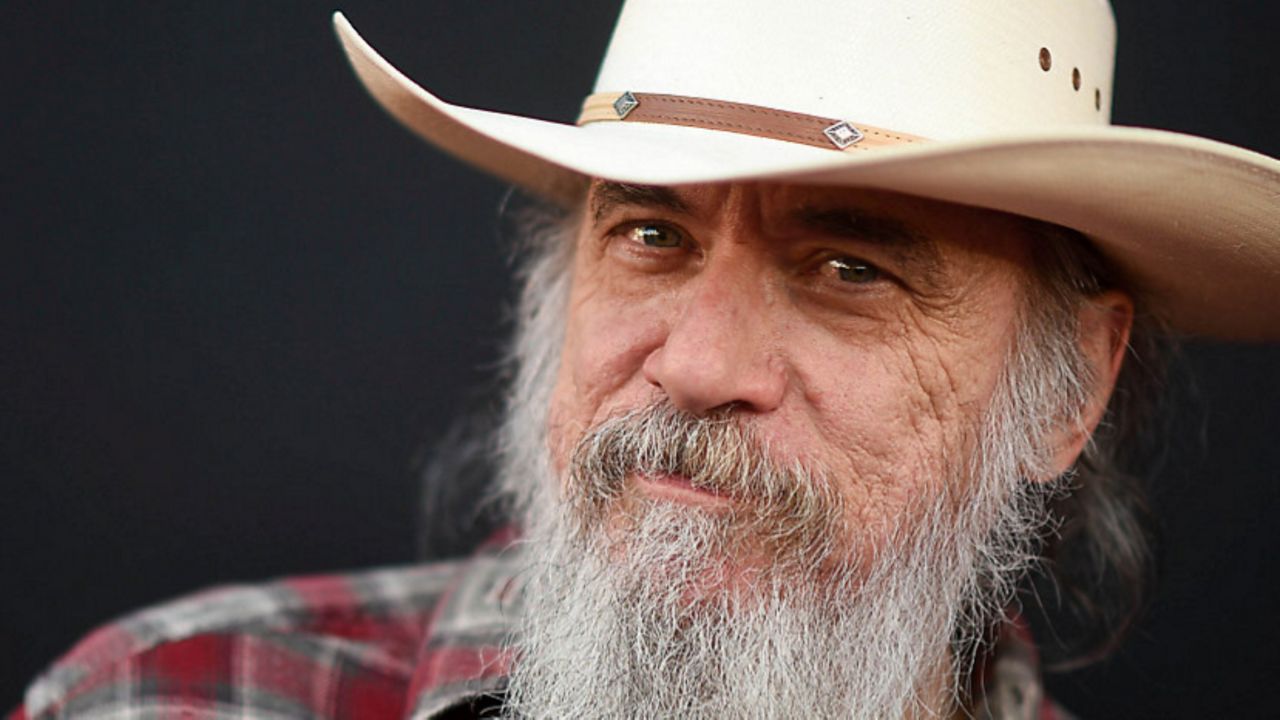 Larry Charles arrives at the premiere of 