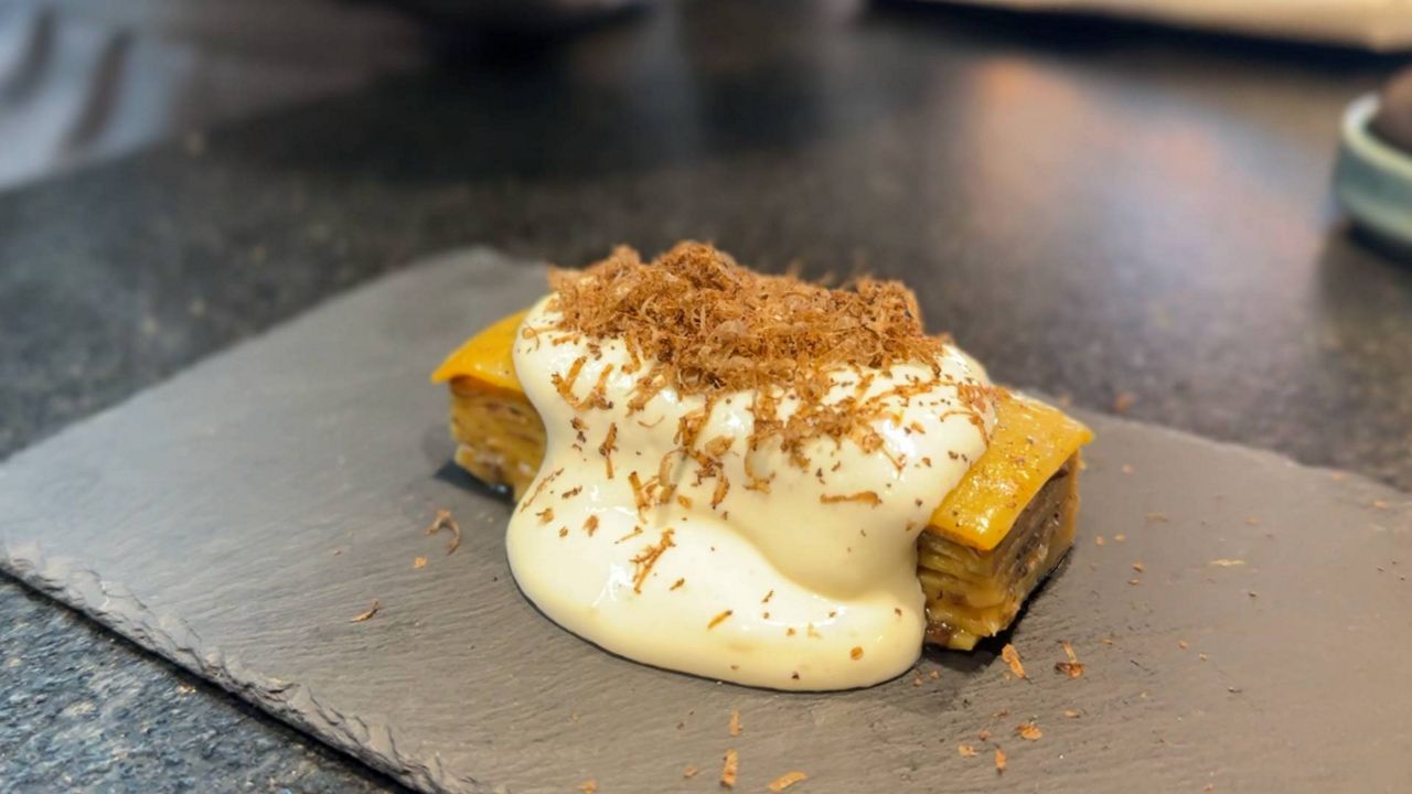 Pictured here is lasagna from Otium. (Spectrum News/Jada Montemarano)