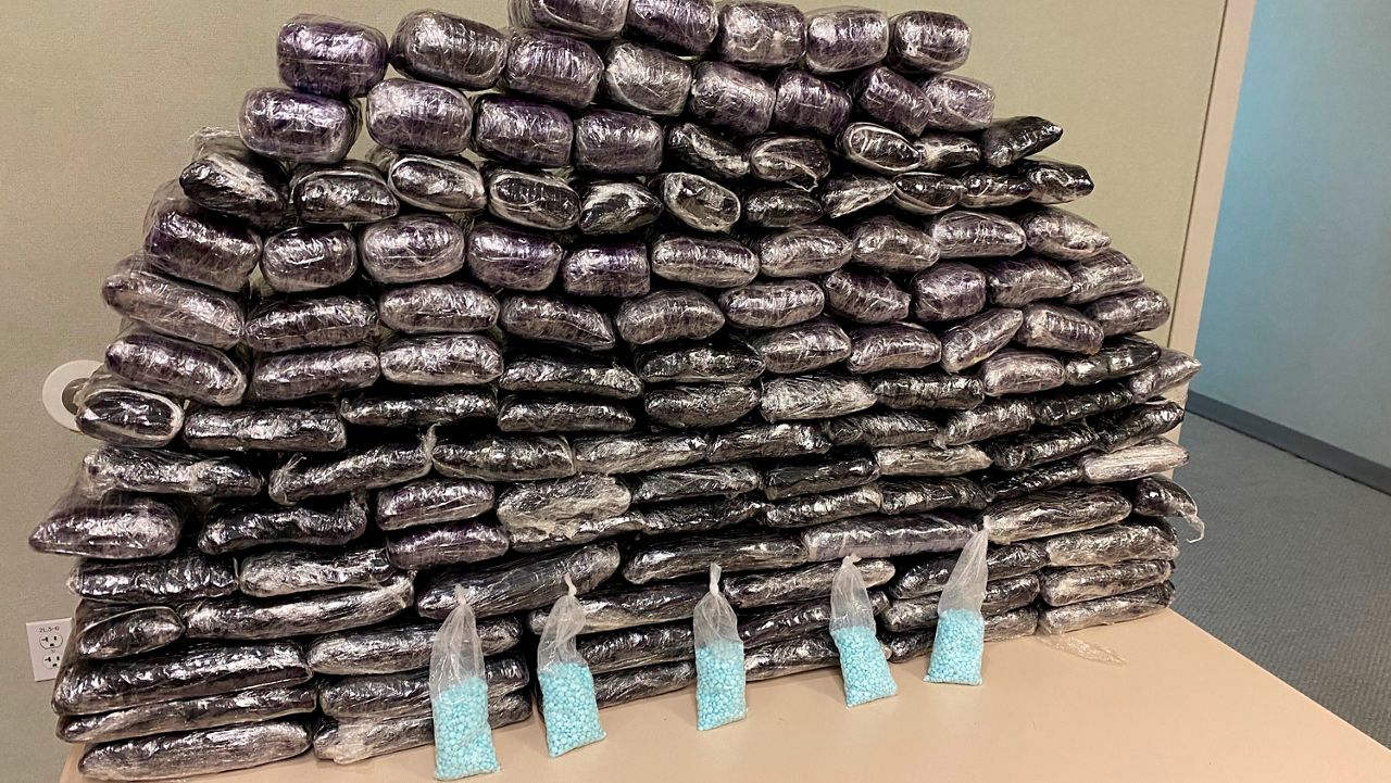 This undated file photo provided by the U.S. Drug Enforcement Administration, Los Angeles Field Division, shows some of the seized approximately 1 million fake pills containing fentanyl that were seized when agents served a search warrant, July 5, 2022, at a home in Inglewood, Calif. (Drug Enforcement Administration via AP, File)