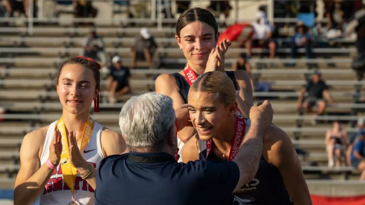Transgender athlete AB Hernandez representing Jurupa Valley High School receives her second place medal in the long jump. (Tomas Ovalle / For The Times)