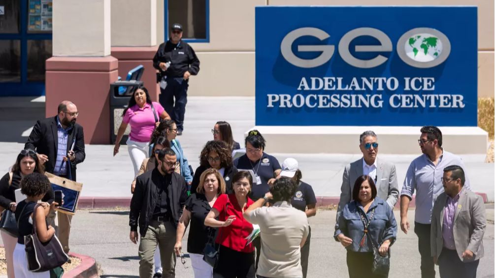 Members of Congress leave the Adelanto ICE Processing Center after a visit. Members of the ACLU and the Inland Coalition for Immigrant Justice also attended and called for accountability and humane treatment of the detainees. (Los Angeles Times/Myung J. Chun)