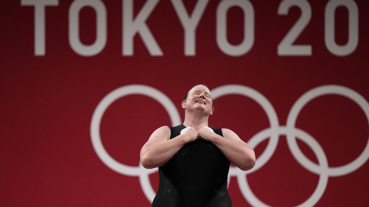 Laurel Hubbard of New Zealand bows after a lift in the women's +87kg weightlifting event Monday at the Summer Olympics in Tokyo. (AP Photo/Luca Bruno)