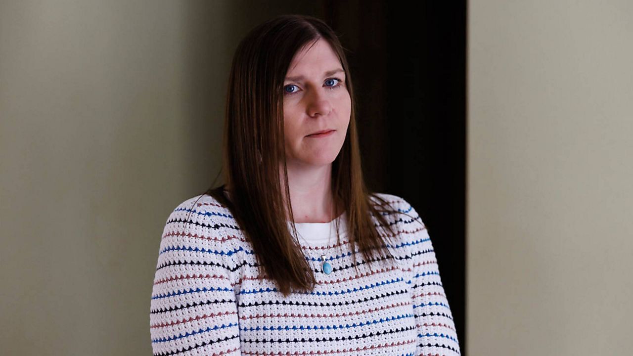 Amber Lavigne, of Newcastle poses on March 25, at her home in Newcastle. Lavigne is suing a school district saying a counselor encouraged her teen's social gender transition without consulting her. The federal lawsuit argues parents' rights trump state statutes allowing school counselors to keep student gender and sexuality information private. (Stephen Davis Phillips/Goldwater Institute via AP)