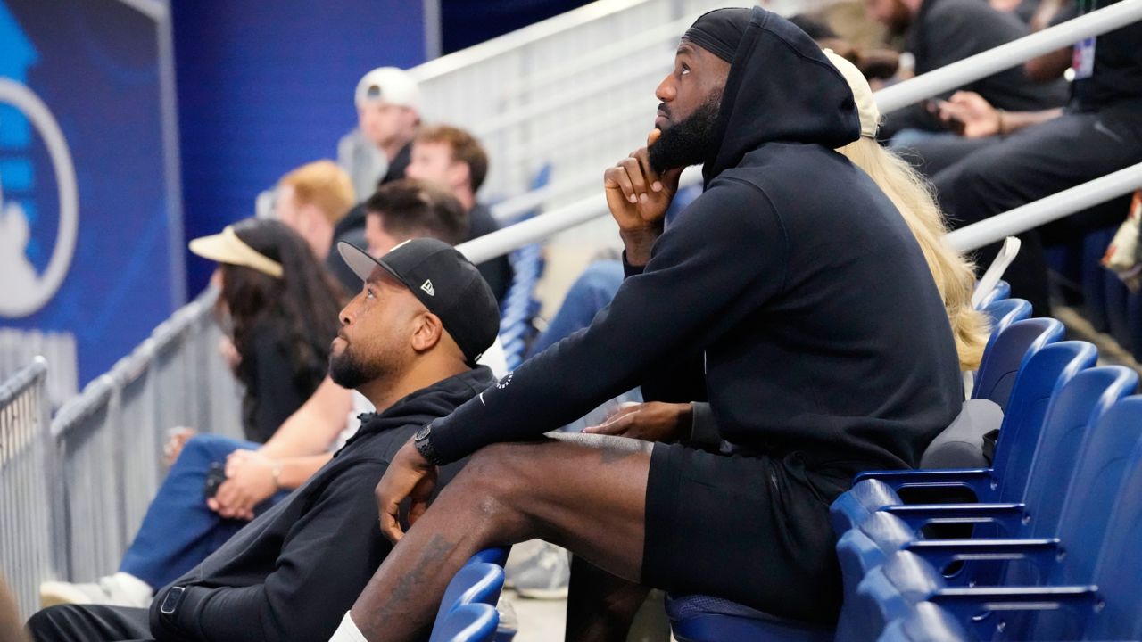 Los Angeles Lakers' LeBron James watches his son Bronny James during the 2024 NBA Draft Combine 5-on-5 basketball game between Team St. Andrews and Team Love in Chicago on Wednesday. (AP Photo/Nam Y. Huh)