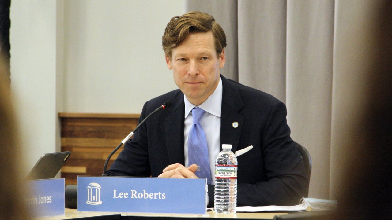 FILE - University of North Carolina at Chapel Hill Interim Chancellor Lee Roberts recaps the university's commencement ceremonies at the UNC Board of Trustees meeting at theCenter for School Leadership Development in Chapel Hill, N.C., on Thursday, May 16, 2024. (AP Photo/Makiya Seminera)