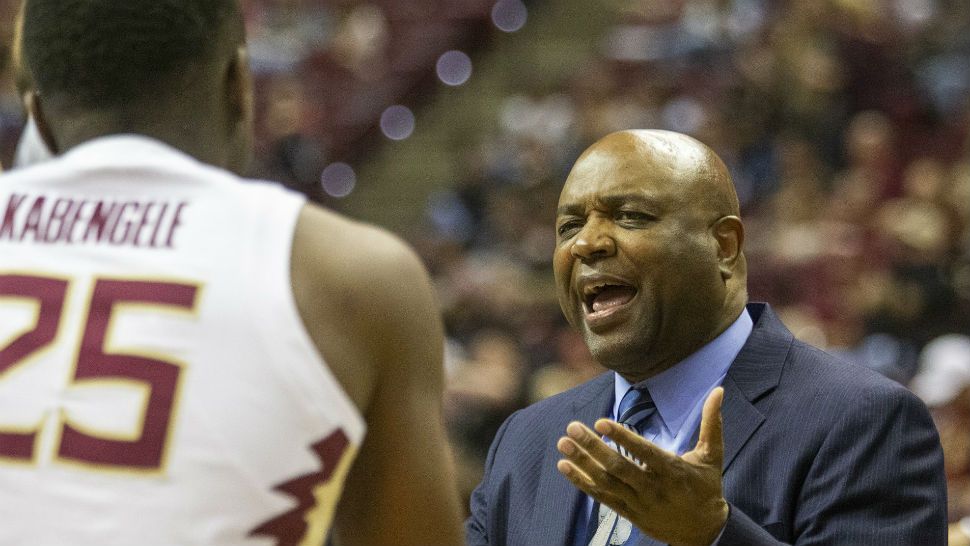 Florida State head coach Leonard Hamilton talks to forward Mfiondu Kabengele in the first half of an NCAA college basketball game against Canisius in Tallahassee, Fla., Monday, Nov. 19, 2018. (AP Photo/Mark Wallheiser)