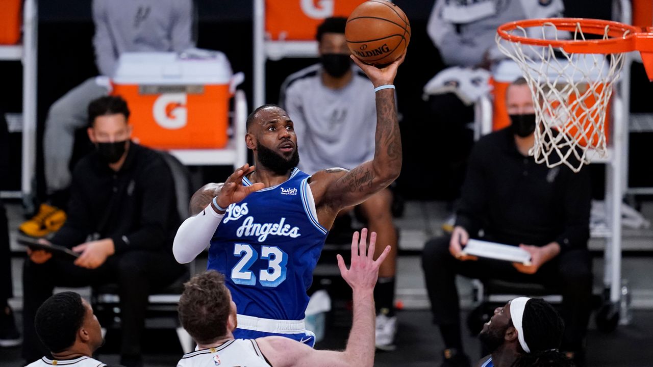 Los Angeles Lakers forward LeBron James (23) shoots during the second quarter of the team's NBA basketball game against the San Antonio Spurs on Thursday, Jan. 7, 2021, in Los Angeles. (AP Photo/Ashley Landis)