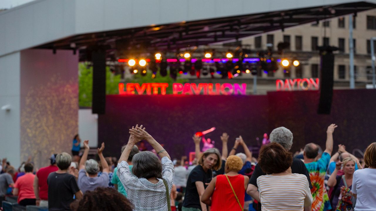 A crowd erupts during an outdoor performance at Levitt Pavilion Dayton in downtown Dayton. (Photos courtesy of Andy Snow)