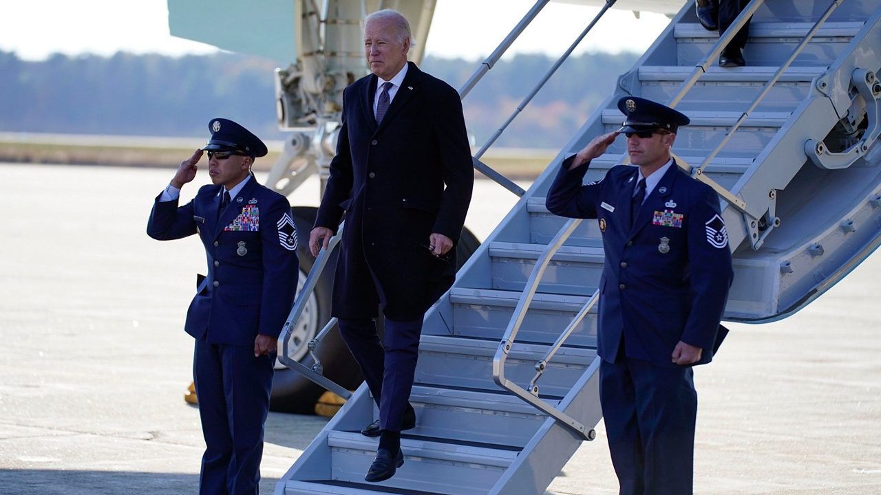 President Joe Biden arrives on Air Force One at Brunswick Executive Airport in Brunswick, Maine, as he heads to Lewiston, Maine, to meet with family members and first responders after a mass shooting, Friday, Nov. 3. (AP Photo/Evan Vucci)