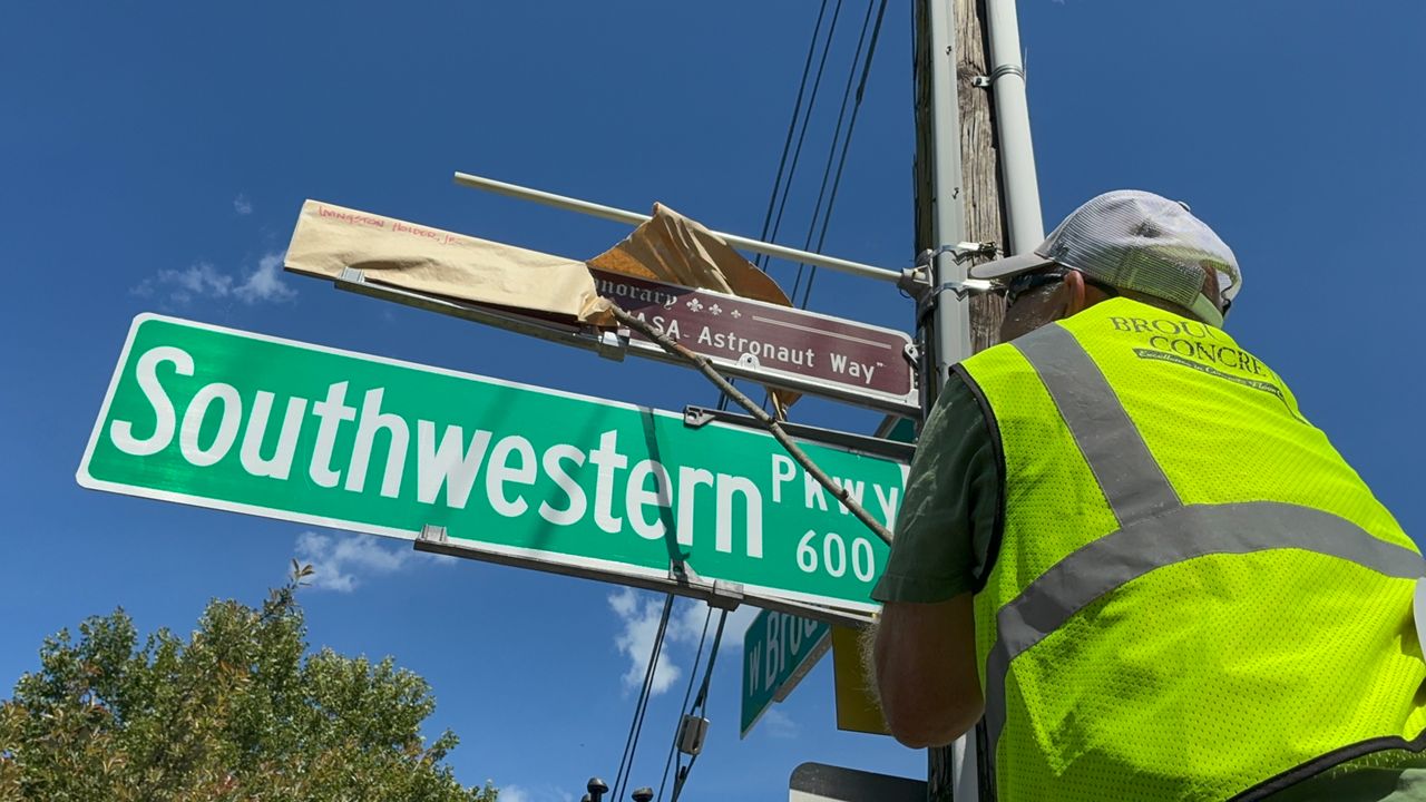 Honorary street sign in Louisville recognizes Livingston Holder Jr.